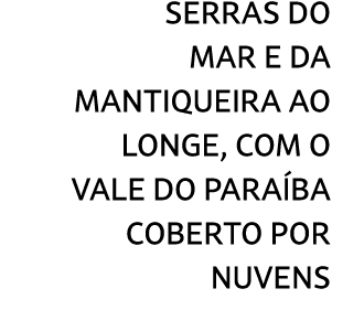 serras do Mar e da Mantiqueira ao longe, com o Vale do Para ba coberto por nuvens